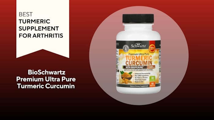 White pill bottle with a yellow label that reads "Turmeric Curcumin" against a red background